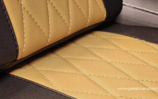 GALA SILVERTEX upholstery textile option: CAMEL/BLACK colors, diamond stitch. Close up, view 02.