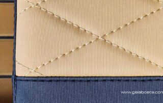 GALA SILVERTEX upholstery textile option: CAMEL/BLACK colors, diamond stitch. Close up, view 01.